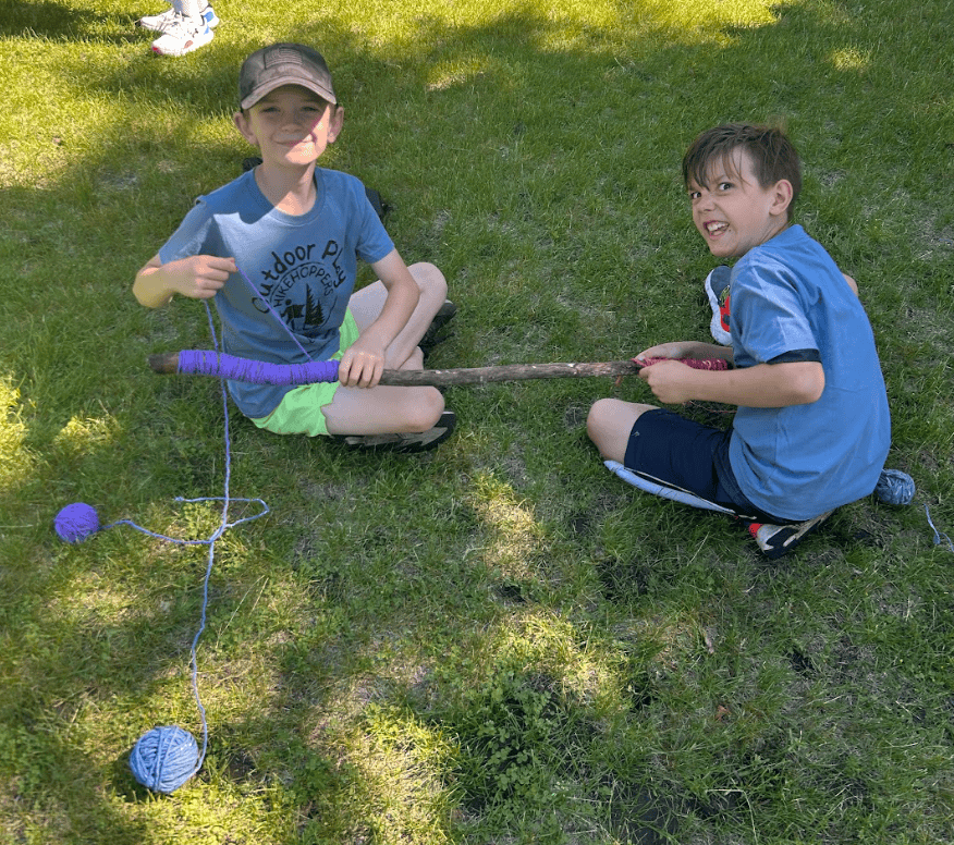 Stumble Upon Art Youth (2 boys) working on an art project