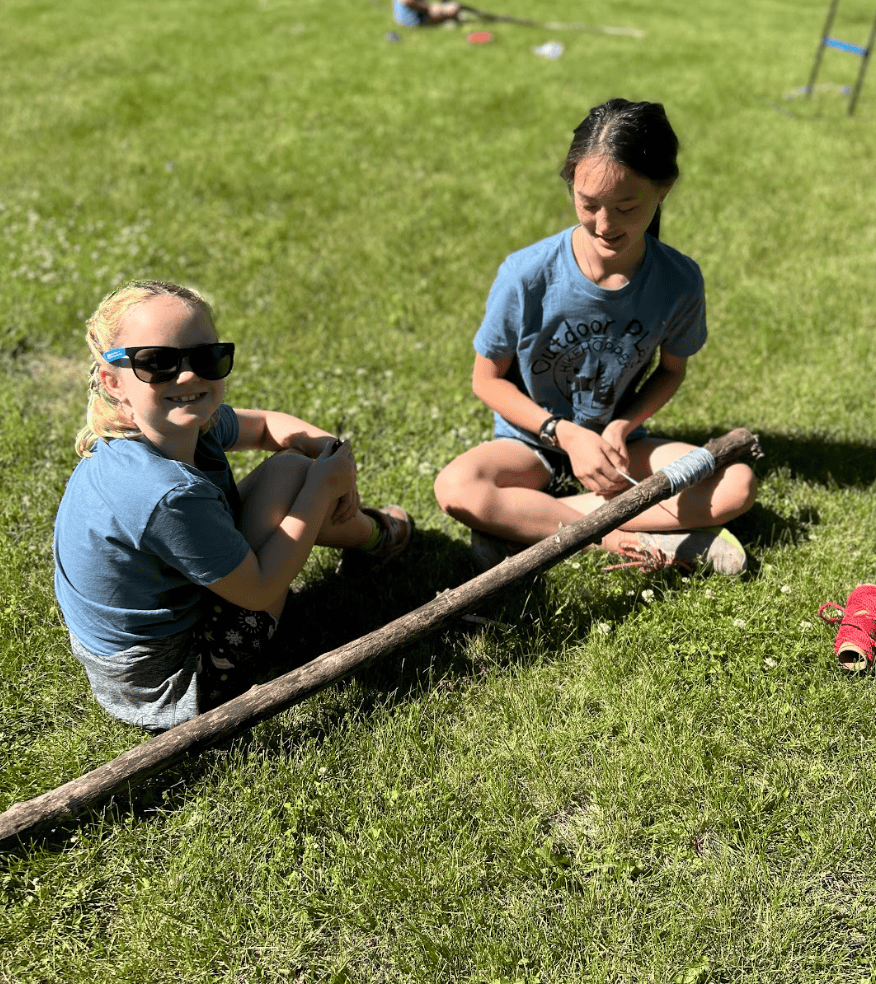 Stumble Upon Art Youth (2 girls) working on an art project