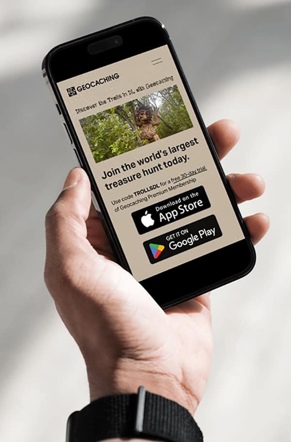 Geocaching app in someones hand